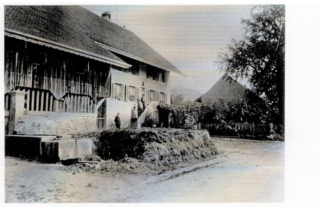 Postkarte von Otelfingen: Landstrasse 3-7 um 1910