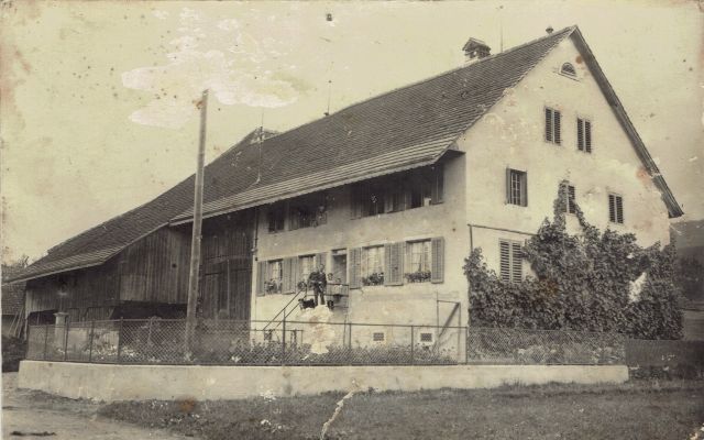 Postkarte von Otelfingen: Landstrasse 3-7 um 1922
